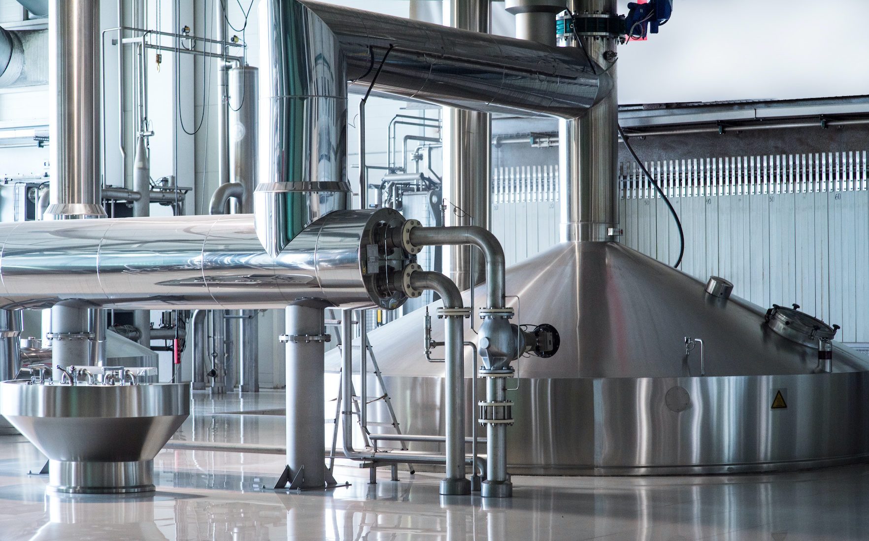 Brewery process equipment in a food & beverage facility